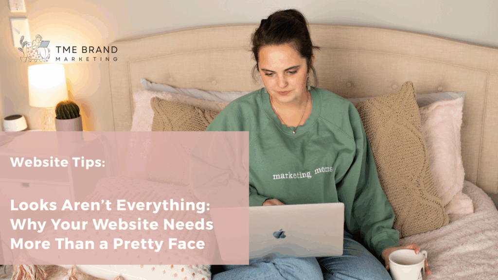 woman looking at computer while drinking coffee